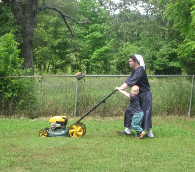 Daniel and Mommy mowing